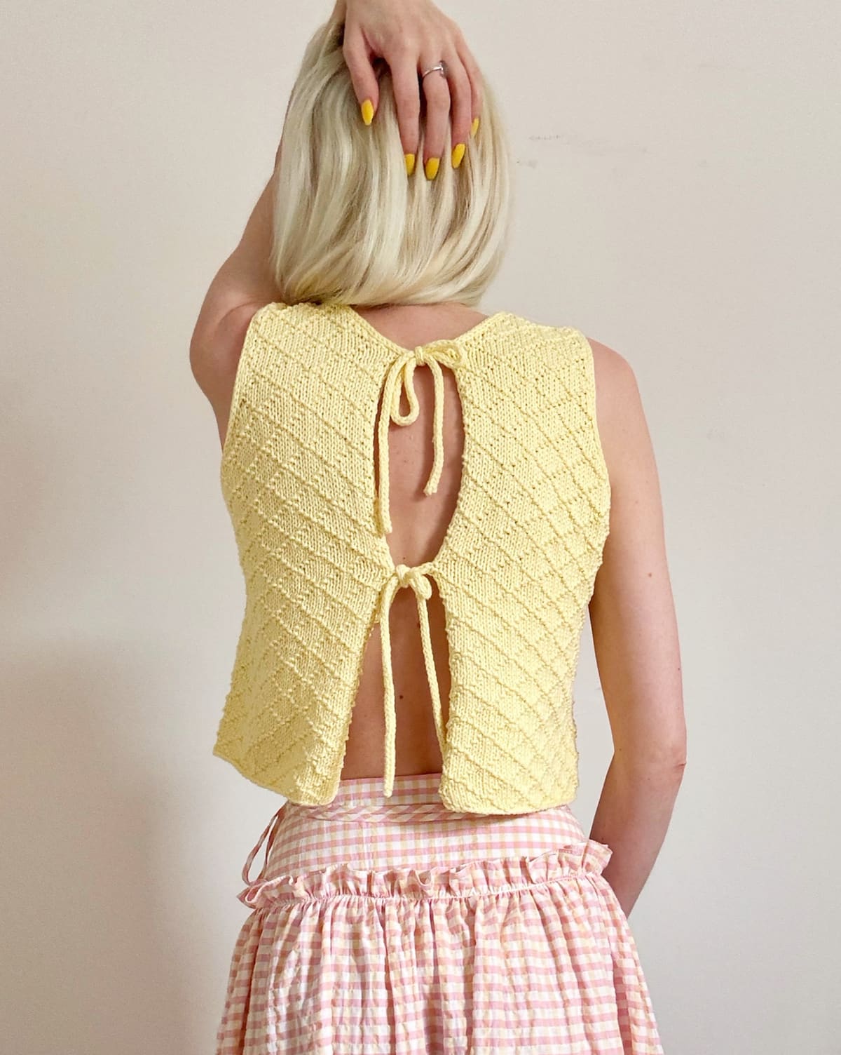 Diamond Tie Vest, a butter-yellow tie-back vest